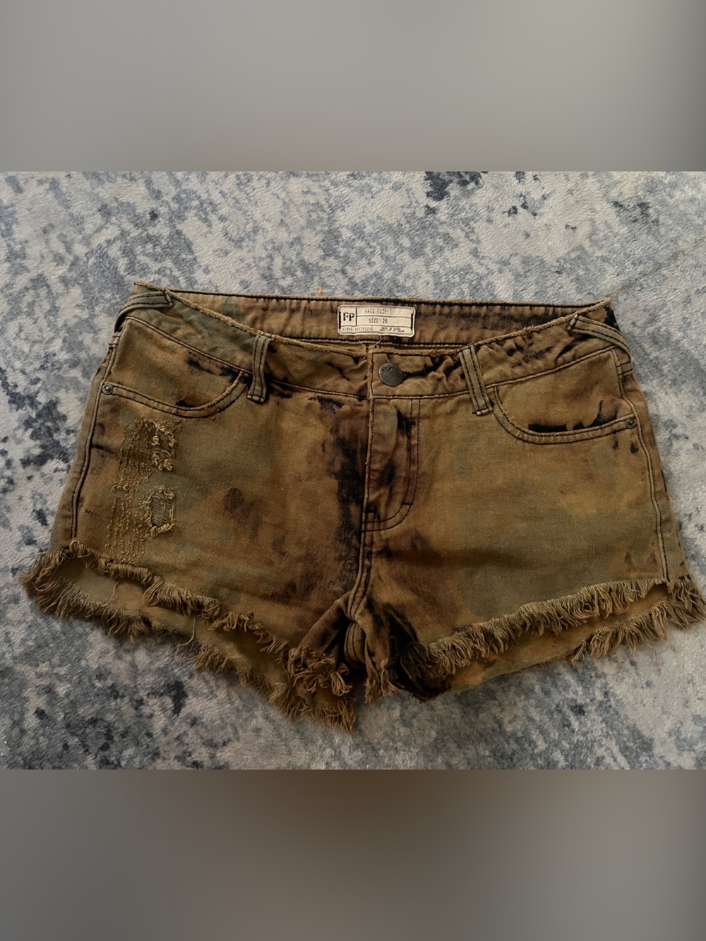 Free People women’s acid washed distressed Jean shorts
